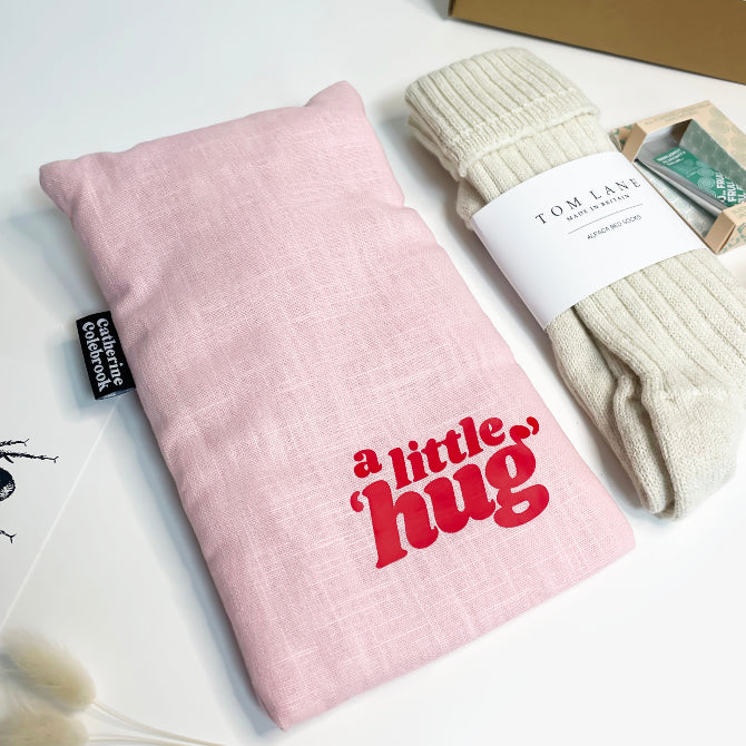 A 'little hug' water bottle with luxurious alpaca socks and a choice of Joe's Tea. A comforting, soothing and thoughtful gift